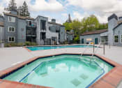 Thumbnail 8 of 20 - our apartments have a resort style swimming pool with apartments in the background
