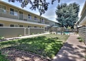 Thumbnail 5 of 29 - Lush Green Courtyard Wit Walking Paths at Mountain View Place, Mountain View, CA