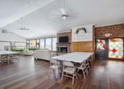 Thumbnail 7 of 8 - A room with a white ceiling and wooden floors has a banner that says "Only families.".