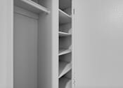 Thumbnail 25 of 41 - A white shelving unit with several shelves