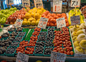 Thumbnail 10 of 41 - A fruit stand with a variety of fruits on display