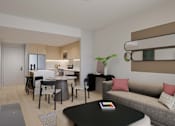 Thumbnail 10 of 18 - A modern living room with a grey couch and a black coffee table.