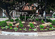 Thumbnail 4 of 37 - A sign for Cederics Landing