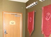 Thumbnail 24 of 37 - A brown door with a sign that says "theater room" on it.