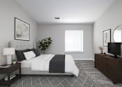 Thumbnail 2 of 18 - A bedroom with a bed, nightstand, and a plant.