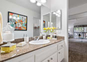 Thumbnail 14 of 57 - a white bathroom with a sink and a mirror