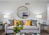 Thumbnail 40 of 57 - our apartments offer a living room with a sofa and coffee table