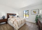 Thumbnail 14 of 41 - the preserve at ballantyne commons apartment bedroom with bed and window