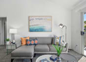 Thumbnail 4 of 68 - a living room with a couch and a coffee table