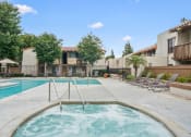 Thumbnail 20 of 24 - our apartments have a resort style pool and lounge chairs