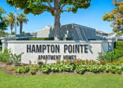 Thumbnail 50 of 68 - the sign for the hamppton point apartment homes entrance in front of a building