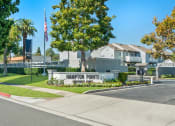 Thumbnail 49 of 68 - a sign for the pointe neighborhood with houses in the background
