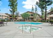 Thumbnail 26 of 32 - the preserve at ballantyne commons pool and patio with apartment buildings