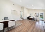 Thumbnail 19 of 34 - a room with hardwood floors and white walls