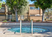 Thumbnail 34 of 34 - a small swimming pool in front of an apartment building