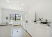Thumbnail 27 of 61 - laundry room, the grand condos by edgewater one ir