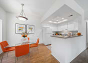 Thumbnail 5 of 61 - a kitchen and dining area in a 555 waverly unit