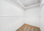 Thumbnail 16 of 61 - a spacious walk in closet in a 555 waverly unit