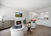 Thumbnail 12 of 61 - our apartments offer a living room with a fireplace