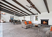 Thumbnail 33 of 41 - a living room with couches and a fireplace