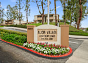 Thumbnail 38 of 41 - the sign apartments on the street in front of the building