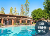 Thumbnail 2 of 34 - a hotel pool with a blue sky in the background and the words $199 move in special