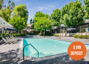 Thumbnail 1 of 38 - an image of a swimming pool with a 189 deposit