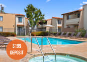 Thumbnail 1 of 19 - a swimming pool in front of apartments with a 199 deposit