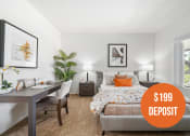 Thumbnail 1 of 61 - a bedroom with a bed and a desk and a 199 deposit on it