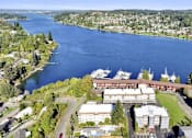 Thumbnail 14 of 14 - A large body of water with boats and a dock.