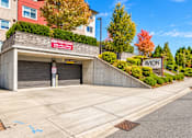 Thumbnail 21 of 21 - A building with a sign that says "Now Hiring" on it.