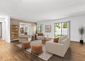 Thumbnail 6 of 16 - A living room with a white couch and a coffee table.