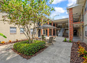Thumbnail 24 of 32 - the courtyard at the whispering winds apartments in pearland, tx