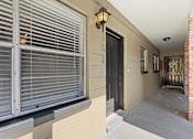 Thumbnail 2 of 32 - a view of the front door of the building