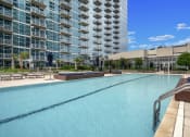 Thumbnail 32 of 114 - Allure Hermann Park | Pool with Private Cabanas