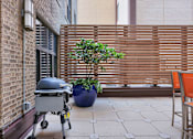 Thumbnail 31 of 40 - The Residences at Barnett | Downtown Jacksonville | Outdoor Patio with Grill