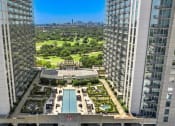 Thumbnail 109 of 114 - Scenic view from skyscraper top, overlooking pool and city skyline in Houston, TX