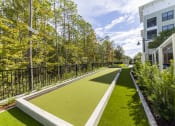 Thumbnail 46 of 60 - Longleaf at St. Johns Apartments | St. Johns, FL | Bocce Ball Court