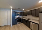 Thumbnail 10 of 21 - Emery Cove Apartments | Tallahassee, FL | Fully Equipped Kitchens