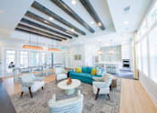 Thumbnail 5 of 27 - Madison Palms | Jacksonville, FL | Clubroom with Kitchen  and TV