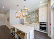 Thumbnail 7 of 27 - Madison Palms | Jacksonville, FL | Clubroom with Kitchen  and TV