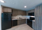 Thumbnail 8 of 24 - Gavin Point Apartments | Jacksonville, FL | Kitchen