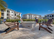 Thumbnail 23 of 44 - Coralina Apartments | Cape Coral, FL | Fire Pit