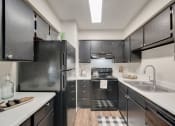 Thumbnail 11 of 47 - The Park at Wintergreen Apartments | DeSoto, TX  | Kitchen