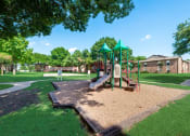 Thumbnail 40 of 47 - The Park at Wintergreen Apartments | DeSoto, TX | Playground and Jogging Path