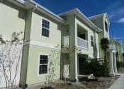 Thumbnail 6 of 10 - Olive Grove Apartments Building Exterior