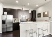 Thumbnail 67 of 114 - Allure Hermann Park | 2 Bedroom Model Kitchen