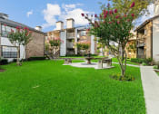 Thumbnail 1 of 37 - Hilton Head Apartments Courtyard with Fountain