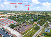 Thumbnail 3 of 28 - an aerial view of the city of bayshore with the downtown tampa skyline in
