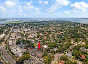 Thumbnail 30 of 32 - an aerial view of a city with a red marker on it